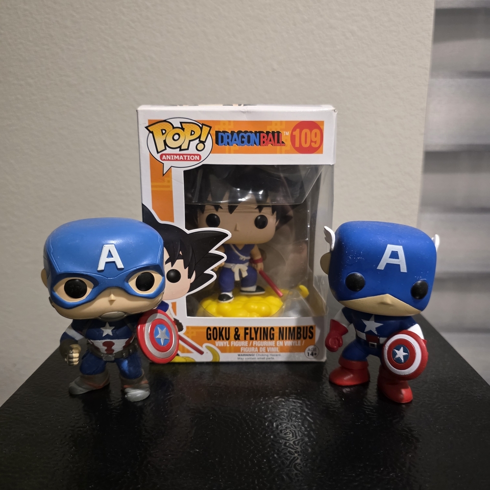 Funko Pop Goku and Captain America Figures